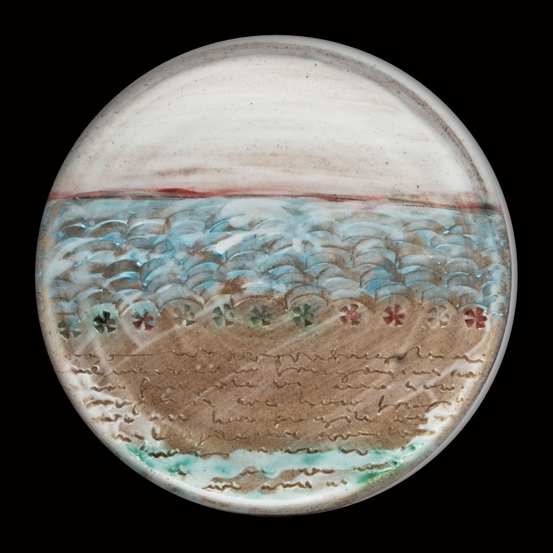 Wall plate, wheel thrown, handmade and decorated with slips and glaze. 27cm x 2cm